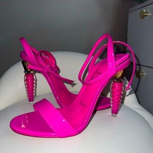 Bright custom pink Christian Louboutin heels. Size 7 woman’s, worn 3 times.